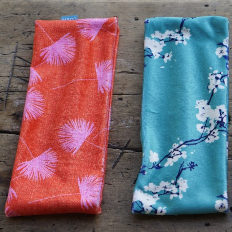 Pannebånd til dame med blomster. Rosa og turkis